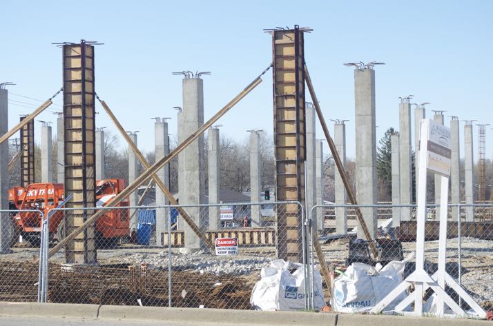 Woodside Village will have retail and residential. Construction has now gone vertical on Rainbow Blvd.