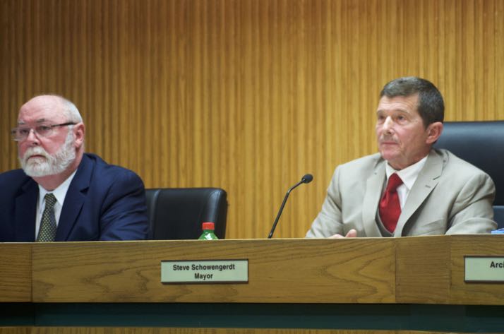 Mission Mayor Steve Schowengerdt (R) and Councilor Pat Quinn listen to residents opposed to the Gateway project. Both voted for the plan.