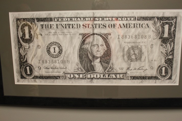 Honorable Mention: "Devil$ in the Detail$" by Jason Benton.