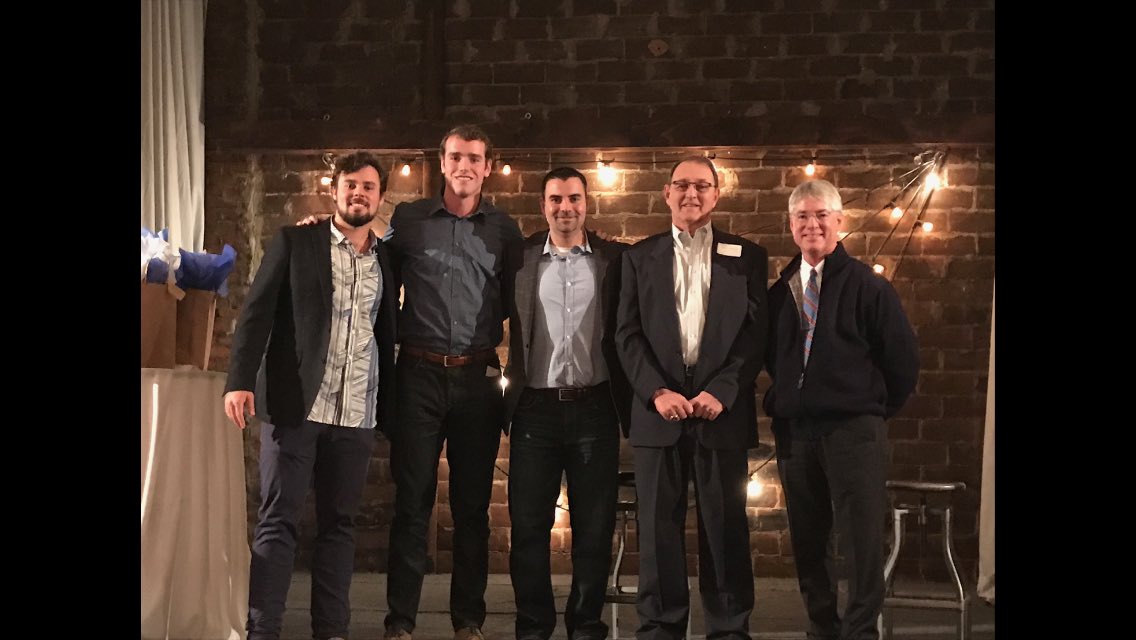 Shawnee Mission East baseball coach Jerrod Ryherd (middle) poses with the inaugural hall of fame class Dylan Becker (left), Joey Wentz, Rusty Newman and Richard Kramer. (Via @SMEAthletics/Twitter)