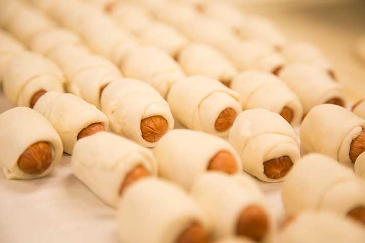 Pretzel-wrapped sausages feature meat from Fritz's.