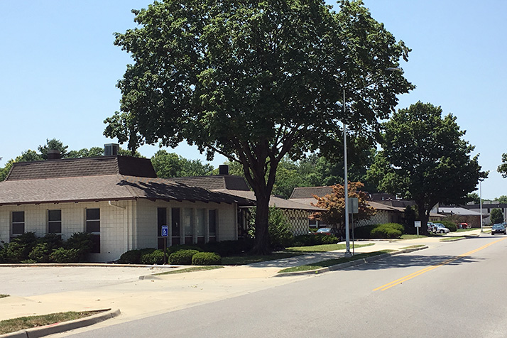 The project site currently has three aging, single-story office buildings, which would be demolished.