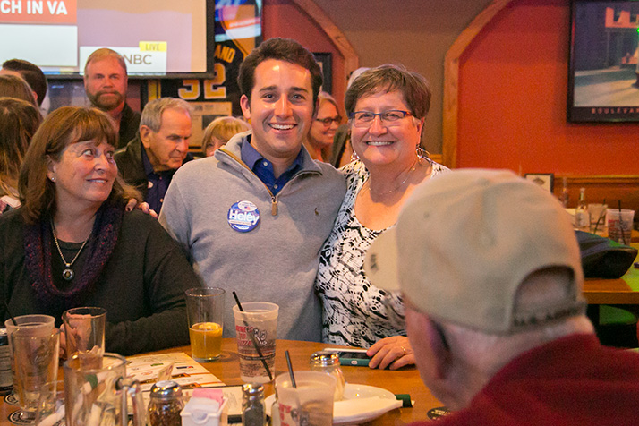 Logan Heley and his mother Kay Heley watched election returns together in downtown Overland Park Tuesday. Both Kay, who ran for WaterOne board, and Logan won their races.
