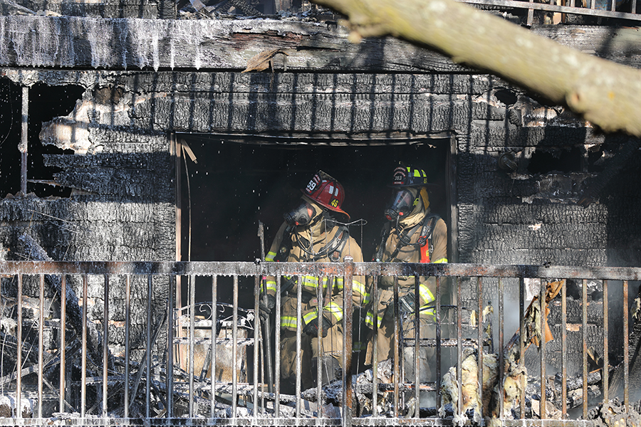 Overland Park apartment fire started by discarded cigarette, say ...