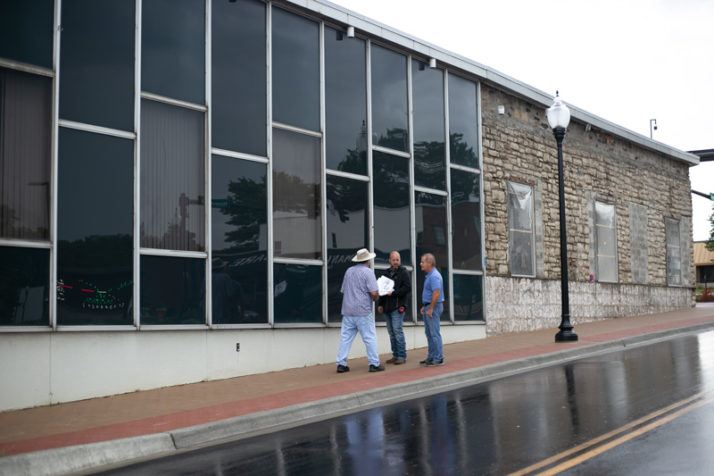 The former Shawnee State Bank building in downtown Shawnee underwent pretty significant facade upgrades in the last couple of years. The glass and steel wrapping was stripped from most of the building, which exposed the original stone work. The building is now home to District Pour House + Kitchen. 