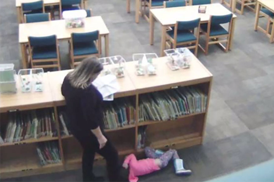 Still image showing Crystal Smith kicking kindergarten student