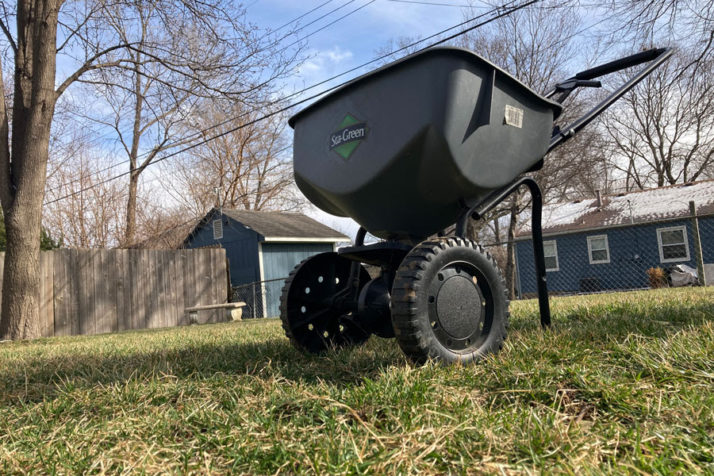 A seeder sits in a lawn in Johnson County
