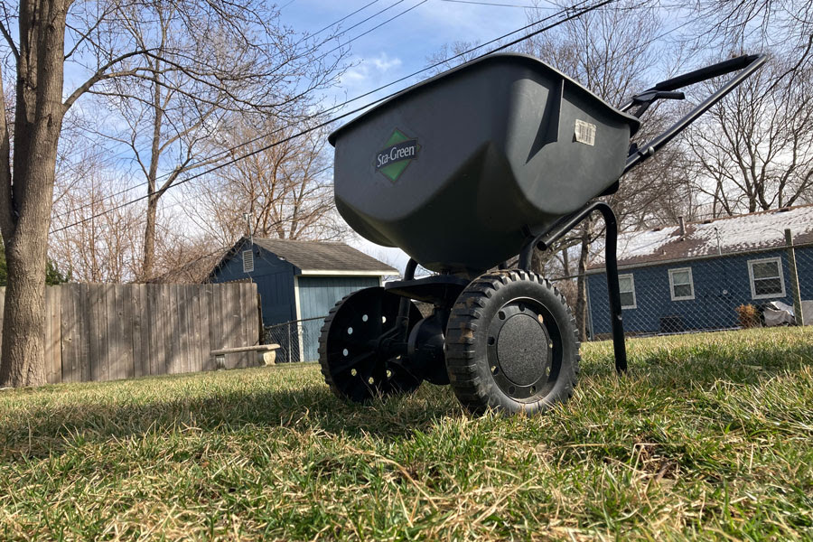 A seeder sits in a lawn in Johnson County