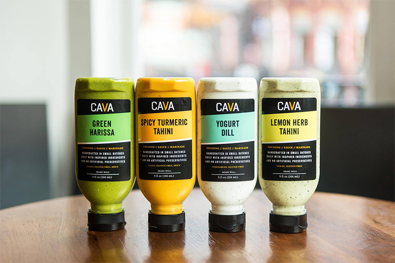 CAVA sells several of its sauces at Whole Foods Market.