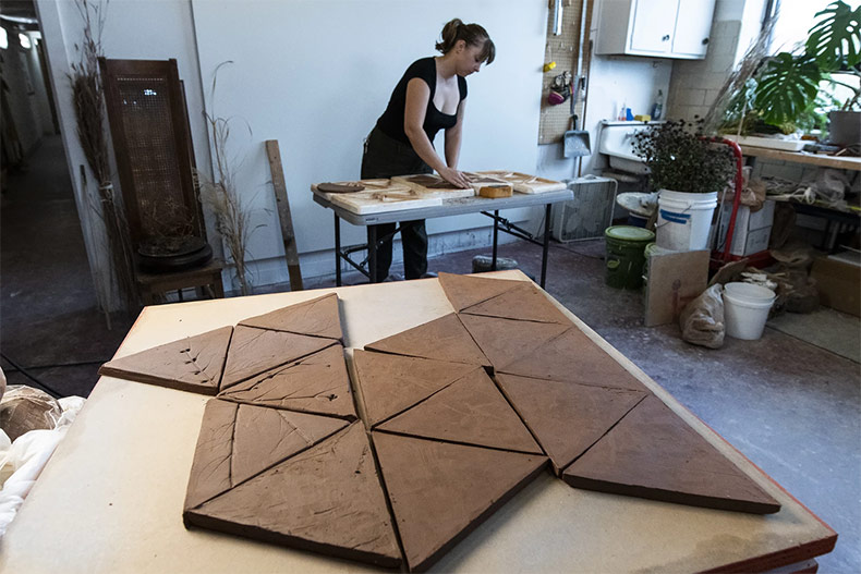 Aritst Kirsten Taylor works in her studio at KU in Lawrence.