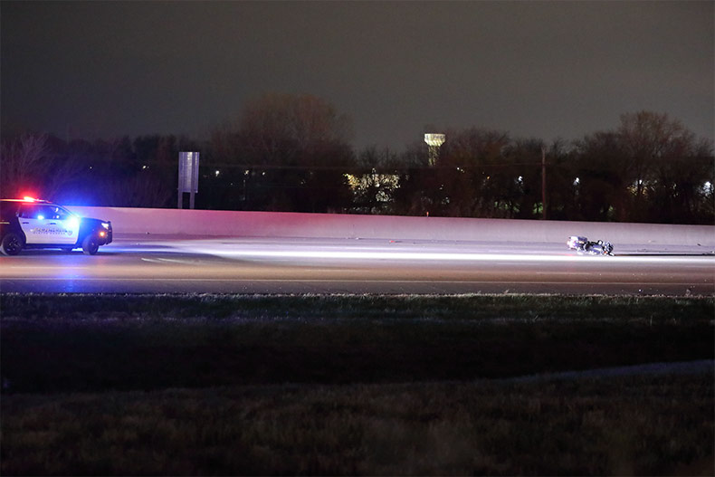 The motorcycle down on the interstate.