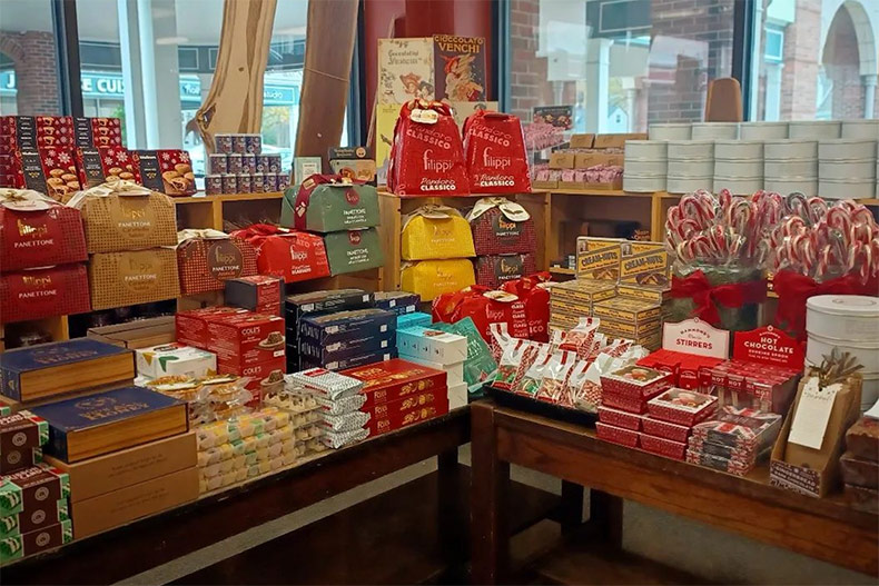 The holiday sweets table at Better Cheddar in Prairie Village, featuring seasonal Panettone and fruit cakes, among other delicacies. Photo via Better Cheddar. 