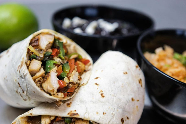 A burrito and sides from Taco Hangover, a new Mexican restaurant in Shawnee.