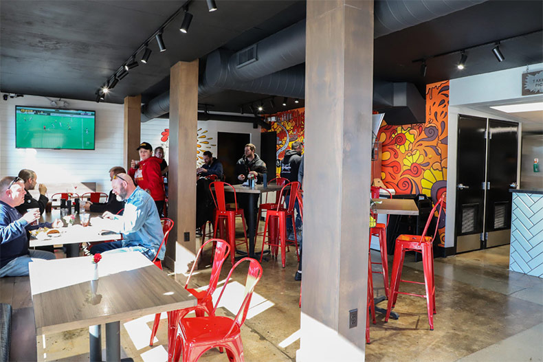 KC-based Mother Clucker! has opened its doors in downtown Shawnee. The new restaurant has a collection of large murals on display.