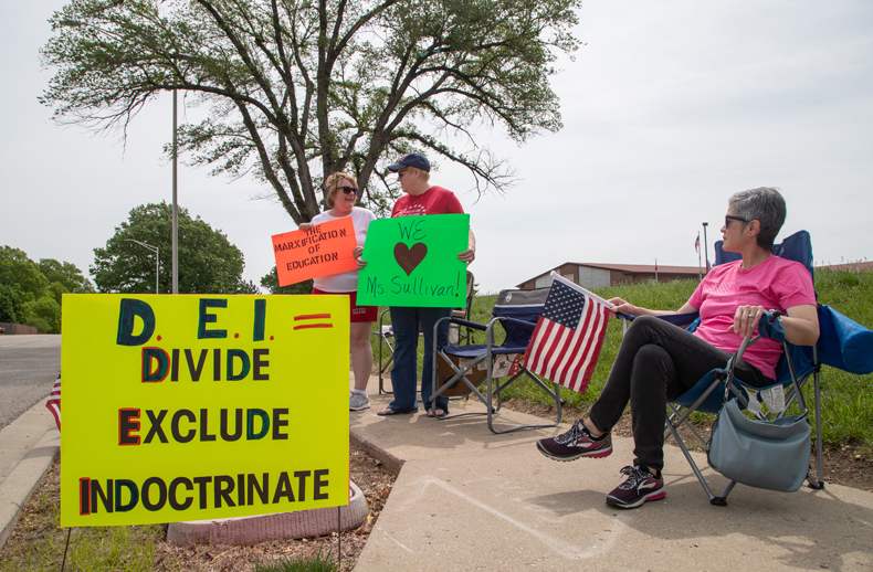 SM North walkout Sullivan supporters holding signs. 