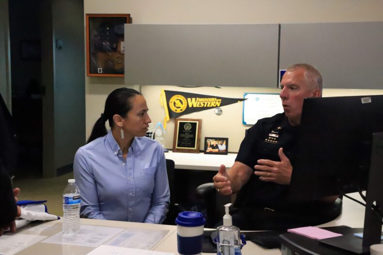Rep. Sharice Davids and Overland Park Police Chief Frank Donchez discuss the department's police transparency page and other community outreach endeavors. Davids toured the police department headquarters on Monday, July 31.