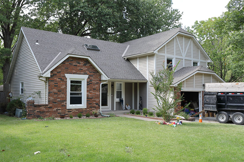 The Shawnee home where Matthew Richards allegedly tried to stab his wife and five of his children.