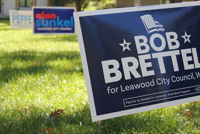 Campaign signs for three candidates running for city council in Leawood's first ward.