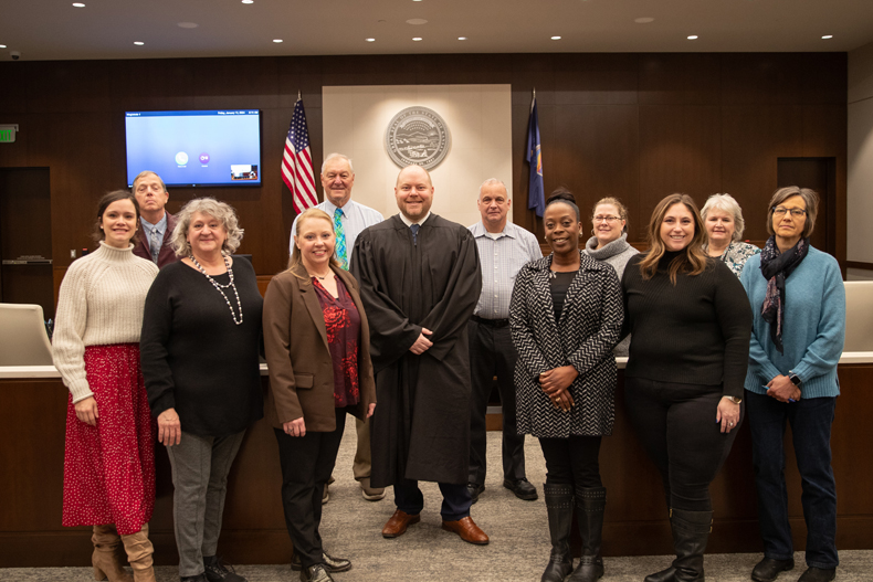 Judge McEntee (center) with mediators at the Johnson County Courthouse on Friday, Jan. 12.