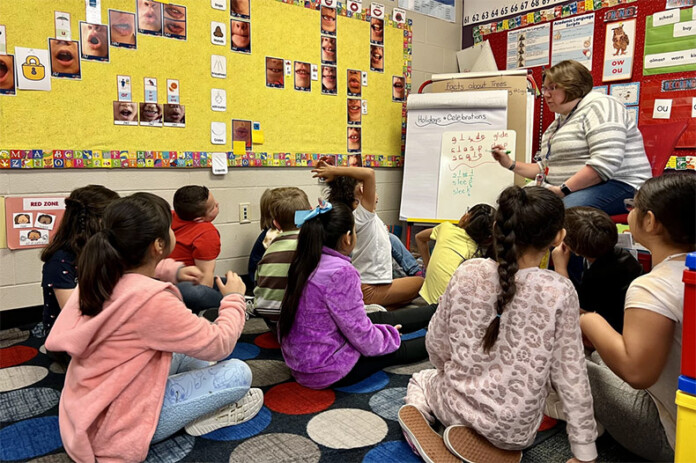 First-grade teacher Heather Mock leads a reading lesson at Washington Elementary School in Wichita.