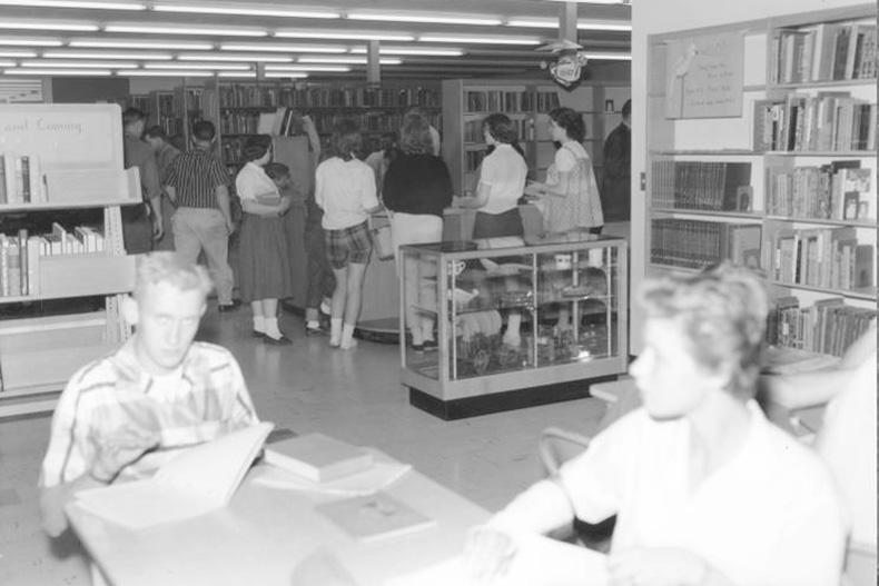 Patrons inside the newly opened Antioch Library around 1957. Photo via JoCo History. 