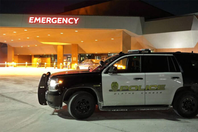 An Olathe Police cruiser outside the emergency room at Olathe Medical Center Friday night, after a 911 call reported a 15-year-old girl had been brought there with a gunshot wound. Davon Washington pleaded guilty to the murder.