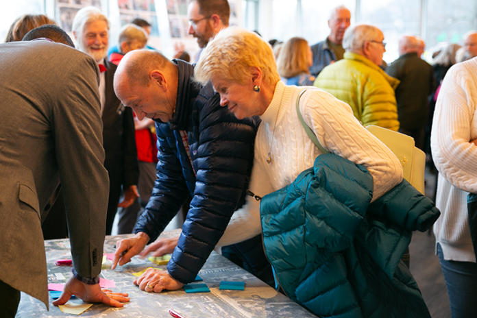 People provide feedback at the first public input session regarding the Prairie Village community center. Photo credit Juliana Garcia.