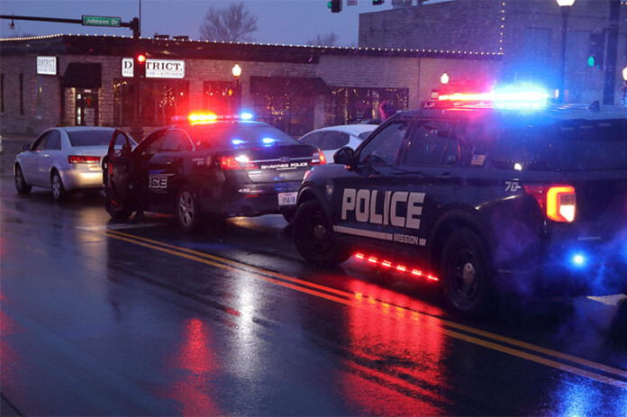 Shawnee Police stop a man's car in downtown Shawnee at Johnson Drive and Nieman Road.