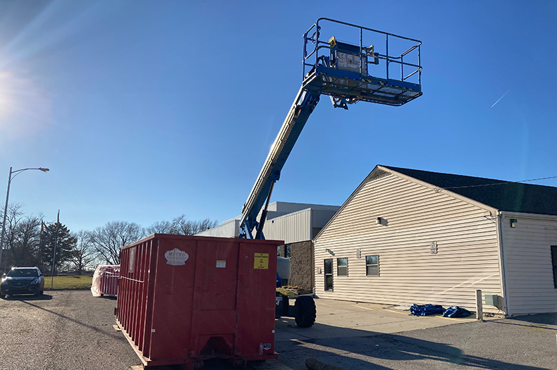 Construction equipment is appearing at the old Johnson County Med-Act building next to the Lenexa Community Center.