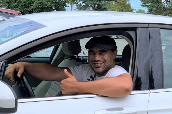 Chris Mays has been a Corey M. Stoltz Transportation Program driver for about six years, using his own experience with mental health issues to offer one-on-one support. Last year, he provided more than 2,000 rides. Photo courtesy Johnson County Mental Health Center.