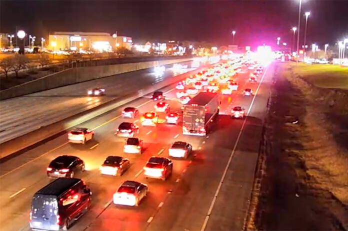 Traffic stalls on southbound I-35 in Merriam Tuesday night following a two-vehicle wreck. Image via KC Scout.