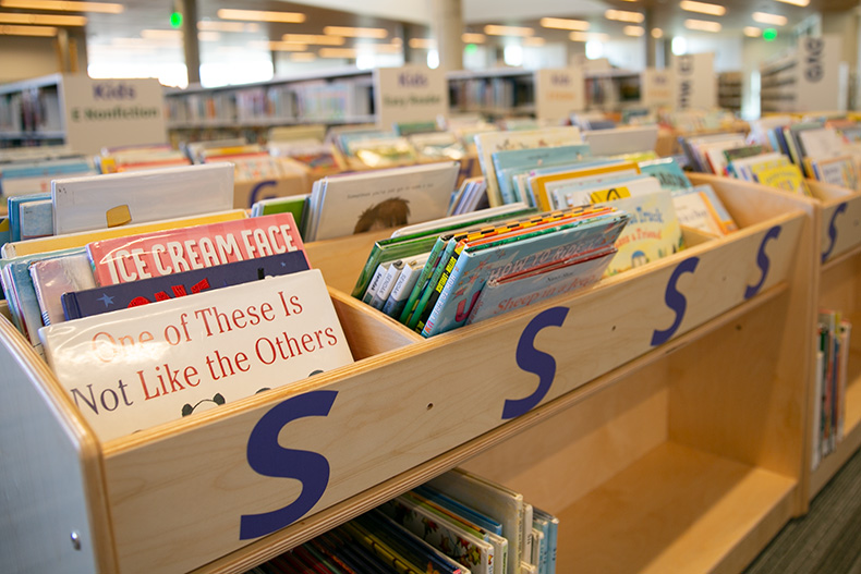 Kids shelving at Merriam Plaza Library