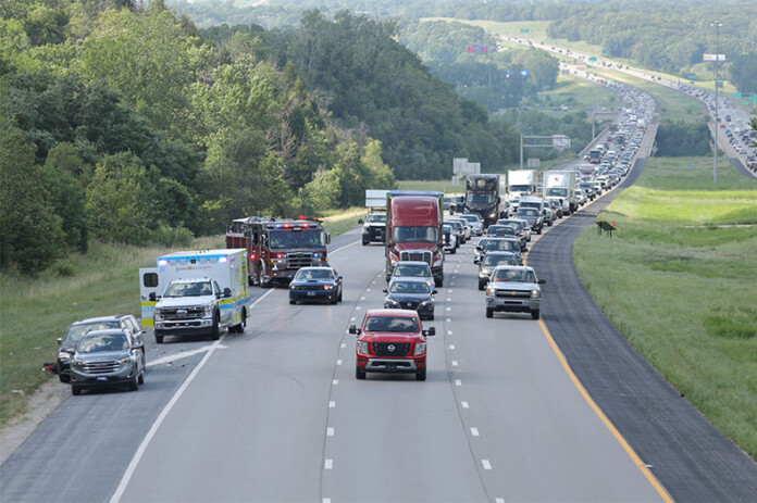Traffic backs up on southbound I-435 in Shawnee after a rollover wreck Monday evening. Photo credit Mike Frizzell.