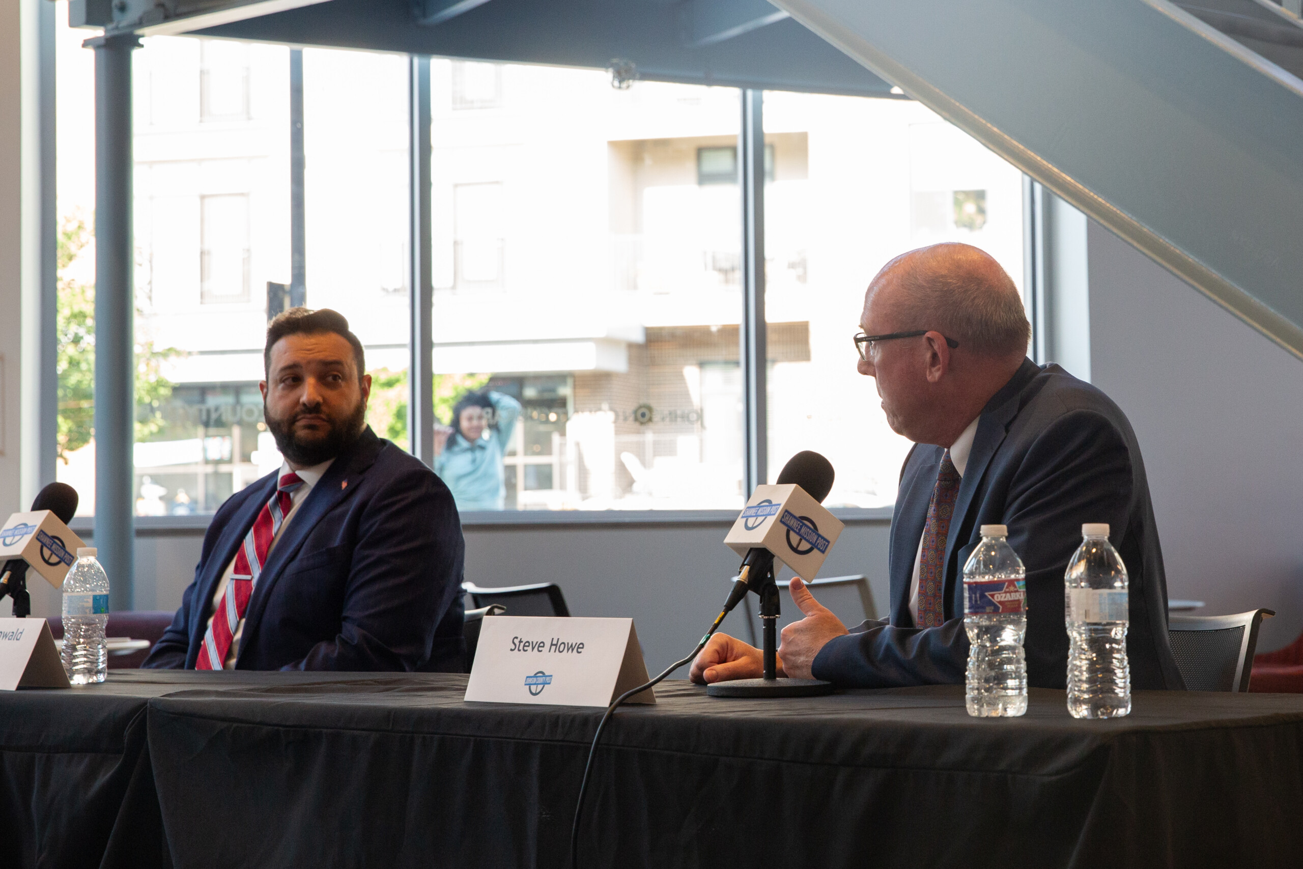 Two candidates participate in a Johnson County DA forum Tuesday night. 