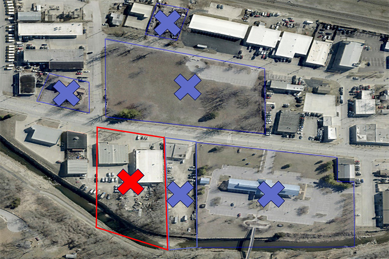 Downtown Merriam properties the city already owns are marked with a blue 'X'