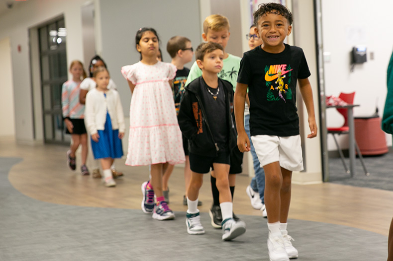 Rushton students walk down hallway