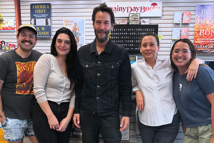 Keanu Reeves with Rainy Day Books staff