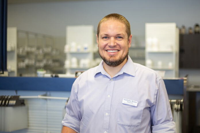 Pharmacist Nick Romo opened Pharmington Drugs in Overland Park two years ago. He promises to charge less for many drugs by not taking insurance.