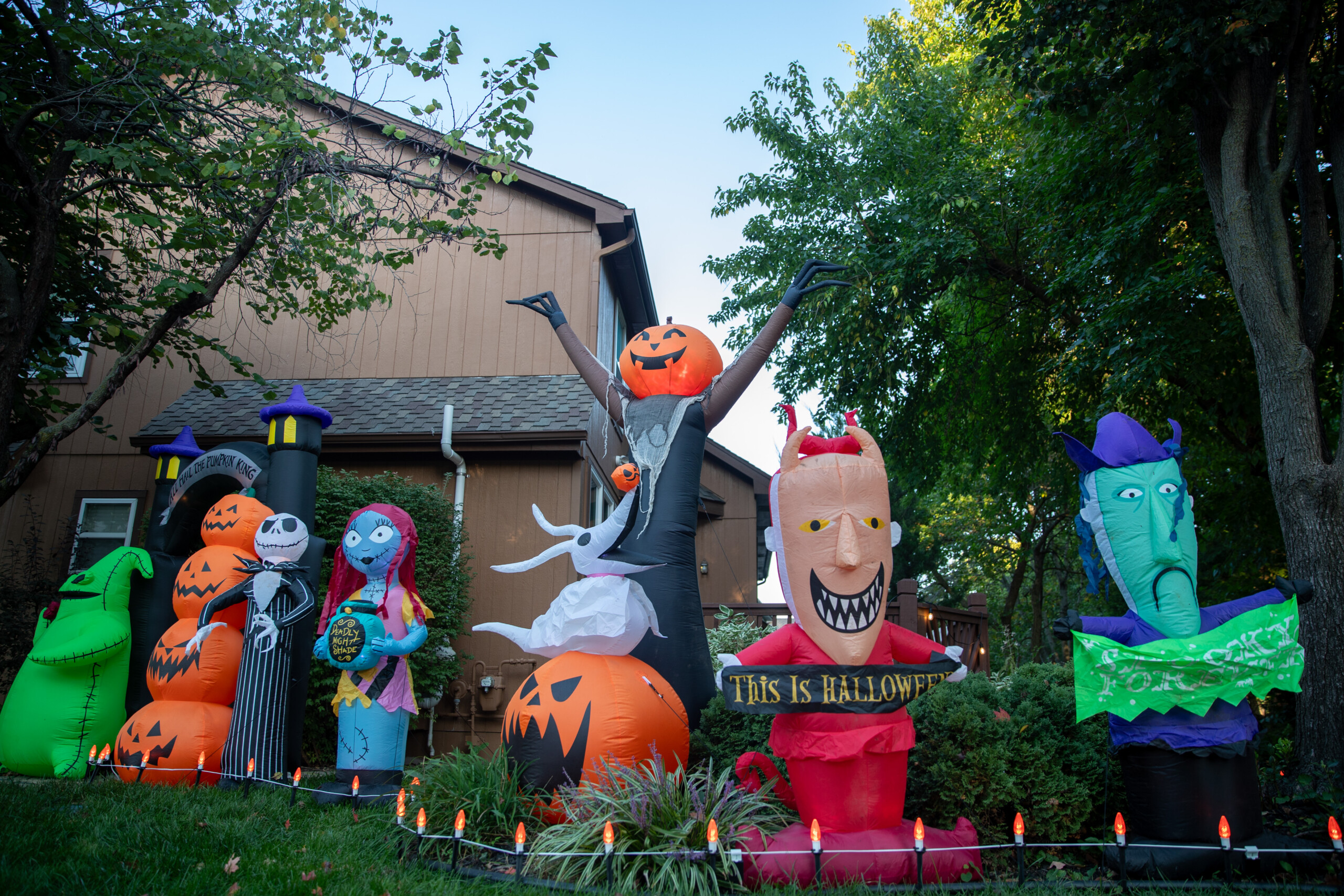 Inflatables line the side of a home on the corner of South Greenwood Street and W 141st Street in Olathe.