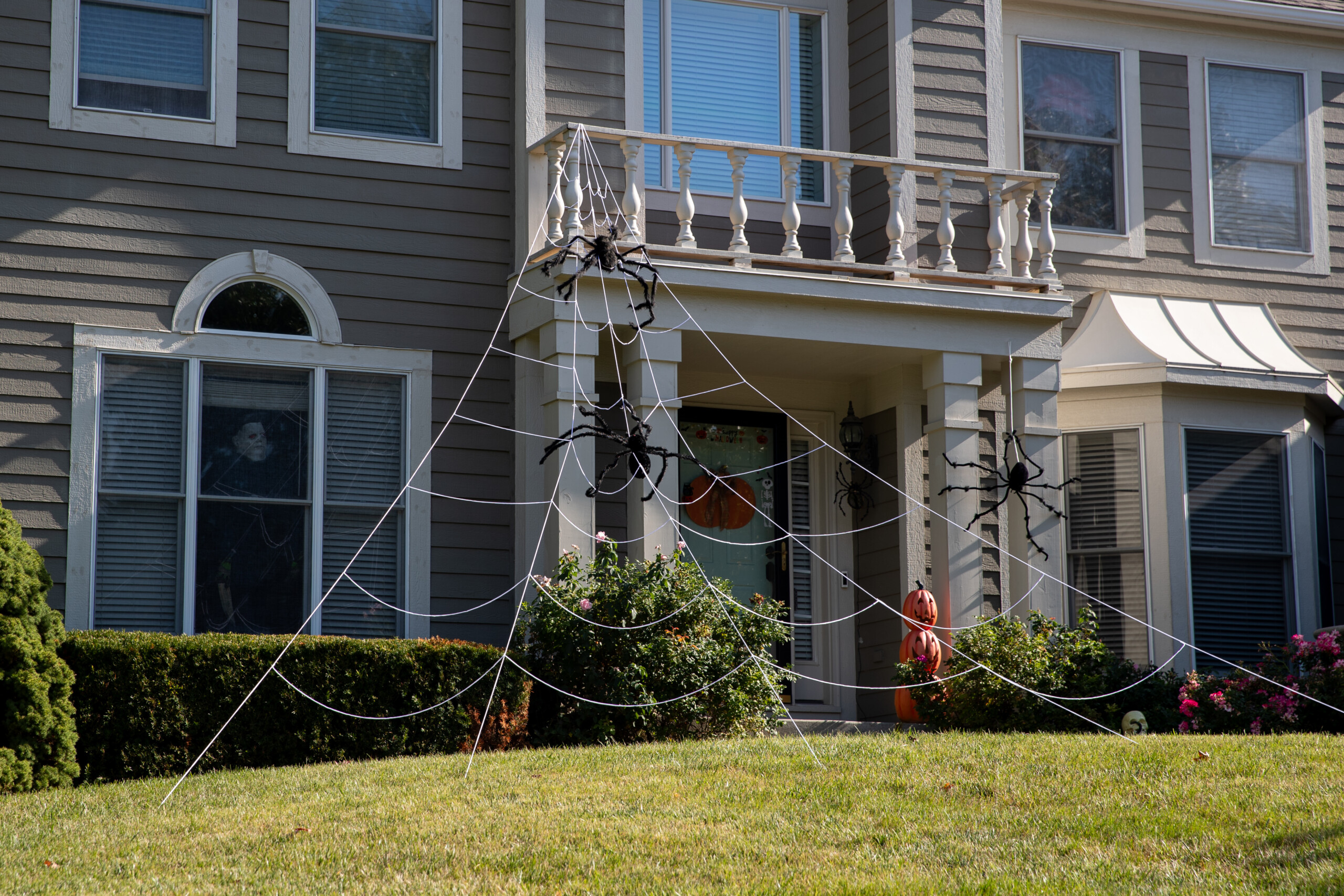 A spider web covers the front lawn of a house off of West 147th Street and Mohawk Road in Overland Park.