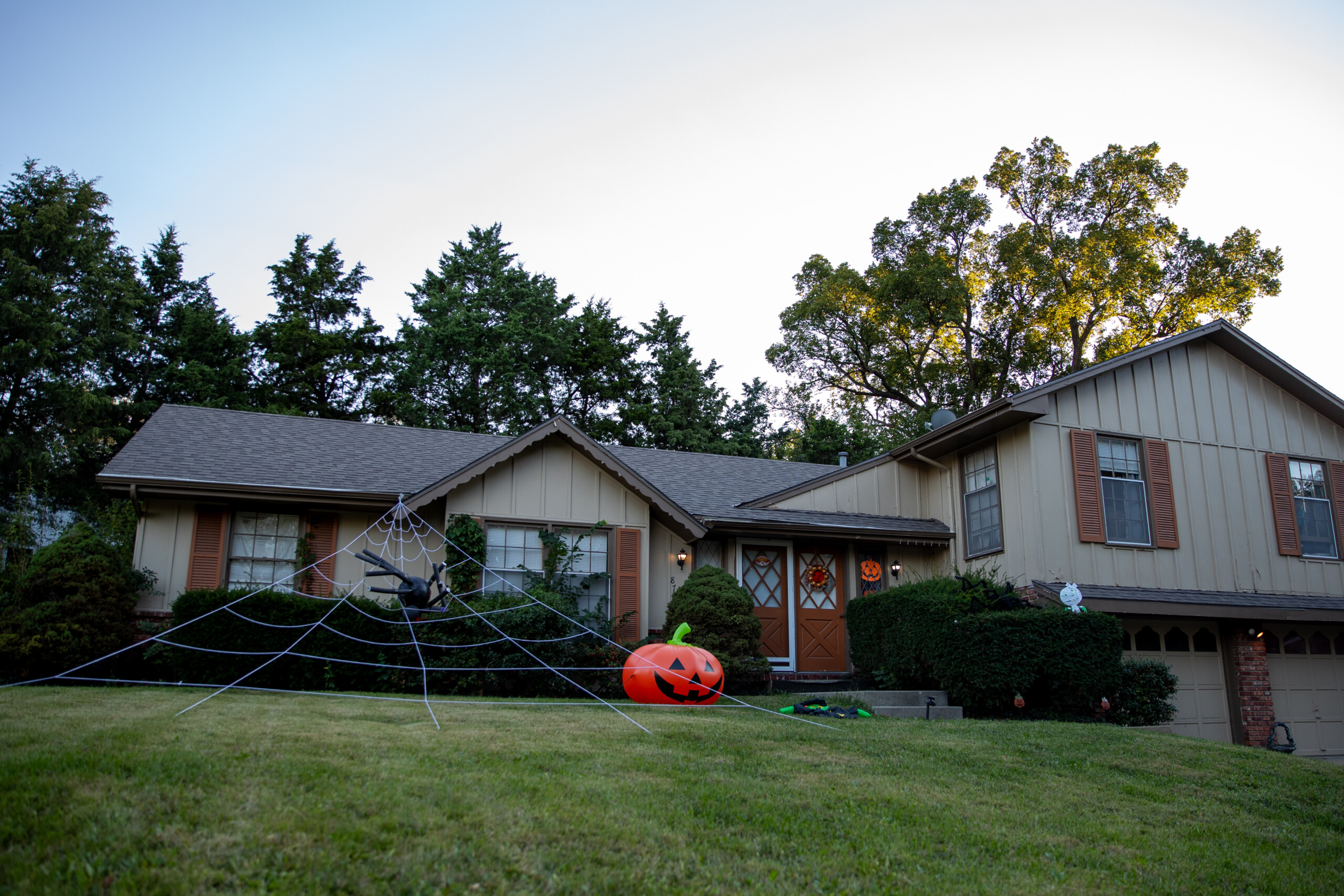 A spider web covers the front lawn of a home on West 79th Circle and Antioch Road.