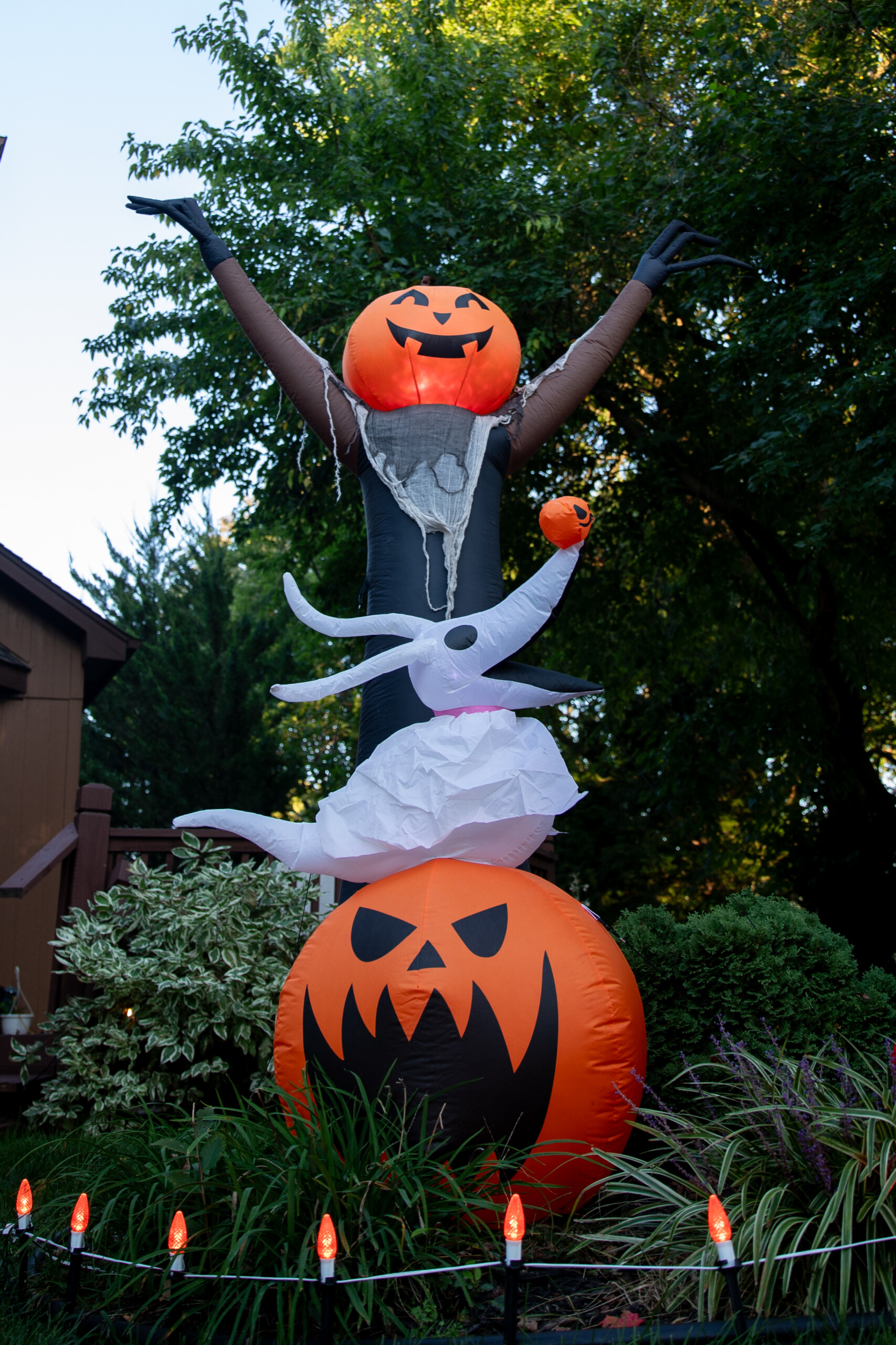 Pumpkin inflatables on the side of a home on the corner of South Greenwood Street and West 141st Street in Olathe.