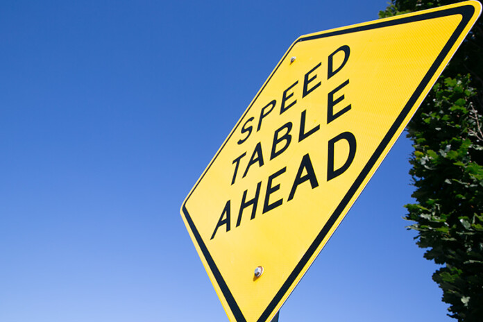 A speed table sign in Mission