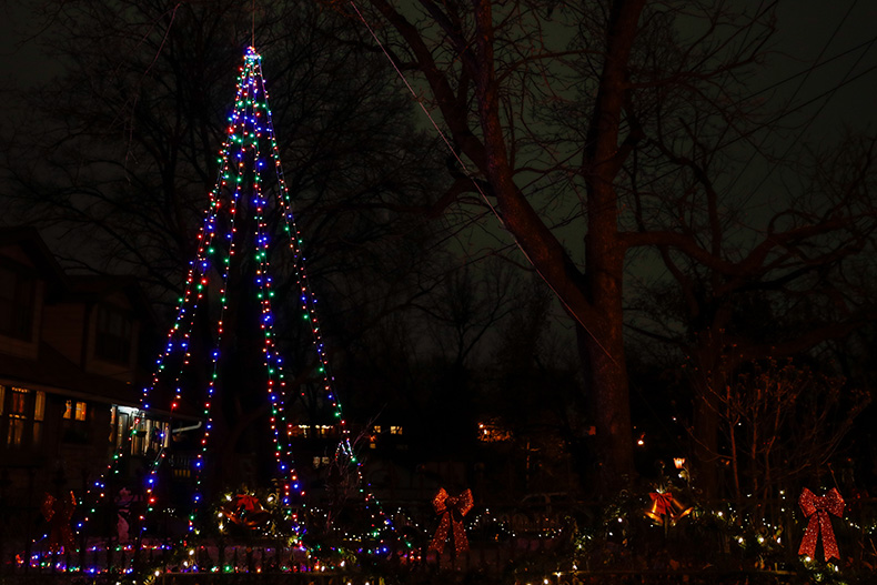 Colorful string lights form a Christmas tree at a house on Knox Avenue and Hocker Drive in Merriam.