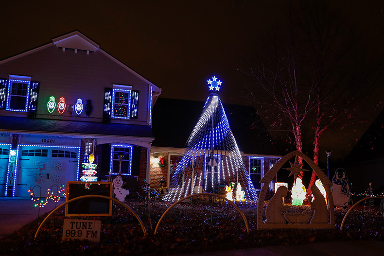 Viewers can tune their radio to 99.9 FM while enjoying a light show outside of a home on Bradshaw Street and West 104th Terrace in Overland Park.