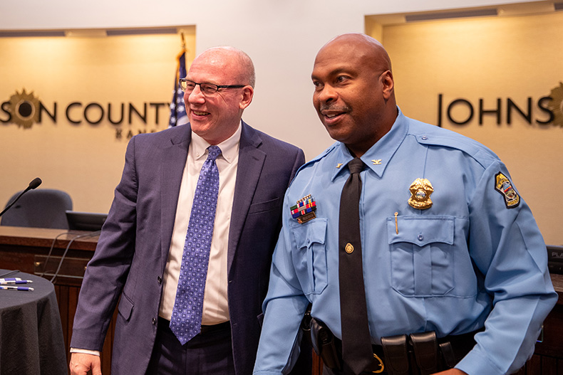 Johnson County District Attorney Steve Howe (left) stands beside Johnson County Sheriff Byron Roberson after their swearing-in ceremony on Monday, Jan. 13.