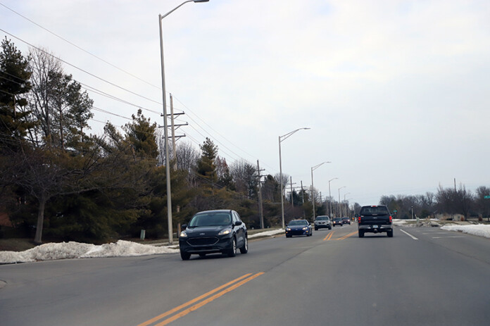 Above, 159th Street east of Mur-Len Road in Olathe.