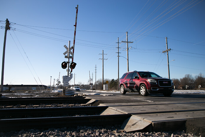 The railroad crossing at South Keeler Street and East Dennis Avenue, just north of Old 56 Highway in Olathe.