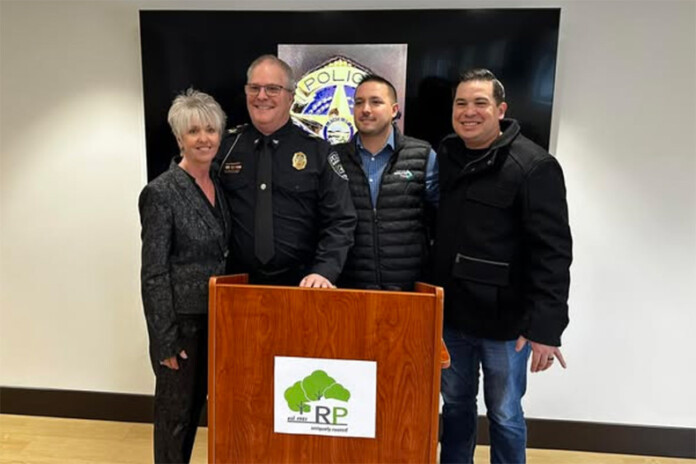 Roeland Park retired police chief and family