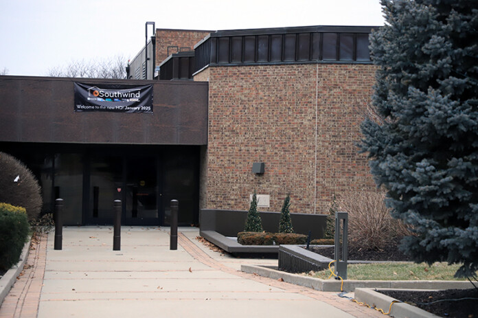 Waddell & Reed's former Overland Park HQ could become home to a home services company that wants to park some of its commercial vehicles on the site as well.